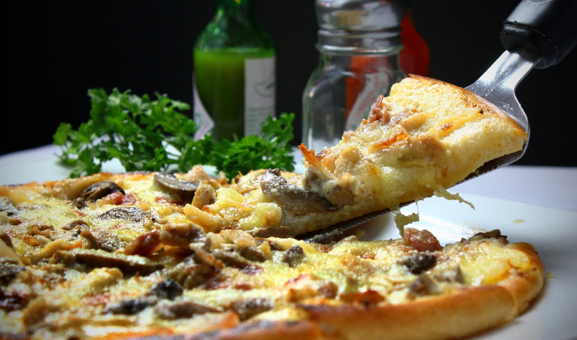 Pizza jamon  y champiñones
